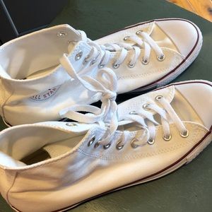 Worn once indoors only, white chuck taylors